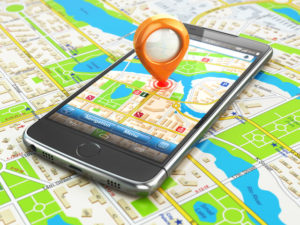 Mobile GPS navigation travel concept. Smartphonewith pin on city
